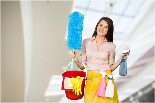 Team applying health and safety standards in a cleaning environment