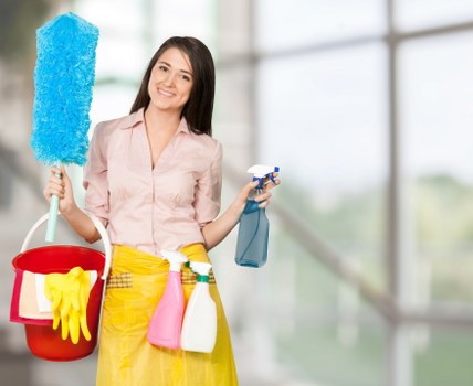 Local cleaner managing a short-let property clean in SW9