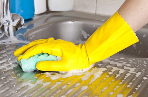 Local patio cleaning service working on a South London courtyard